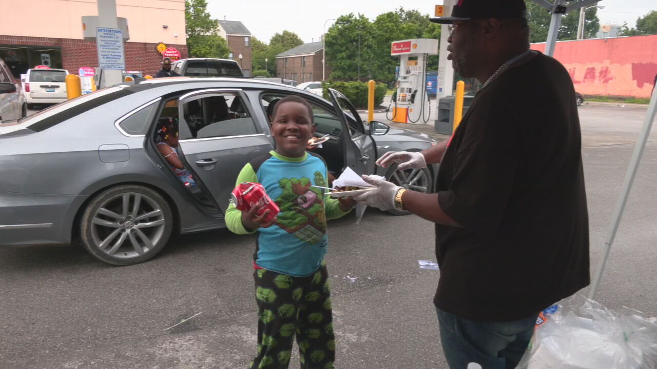 Members of One Nation Riders pass out food to residents of Louisville